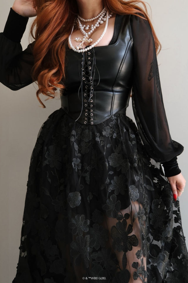 Detail view of the Altered Colour Lace Maxi Skirt, showcasing black floral lace appliqué and sheer layered construction