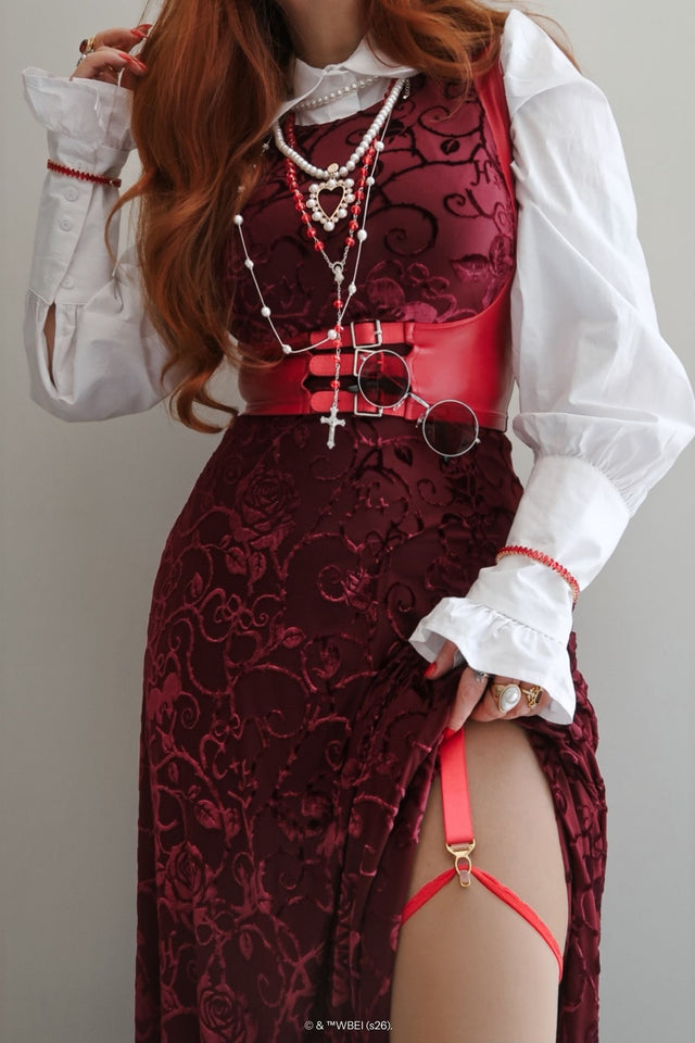 Model wearing the Be With Me Always Black Cherry Burned Velvet Princess Maxi Dress from the Wuthering Heights collection, featuring rich red velvet floral texture, fitted bodice and dramatic thigh split