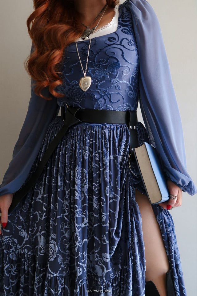 Model wearing the Be With Me Always Slate Burned Velvet Fae Queen Dress from the Wuthering Heights collection, a gothic romantic midi dress with sheer long sleeves, square neckline and textured slate blue burned velvet fabric