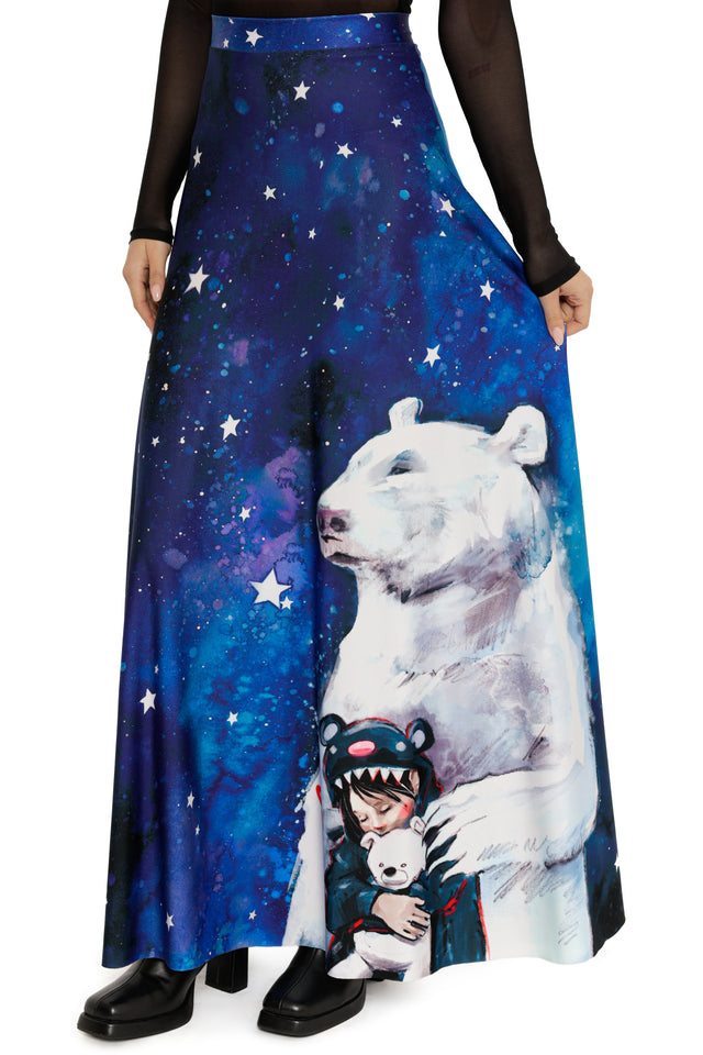 Long pants with a polar bear and space-themed design worn by a person.