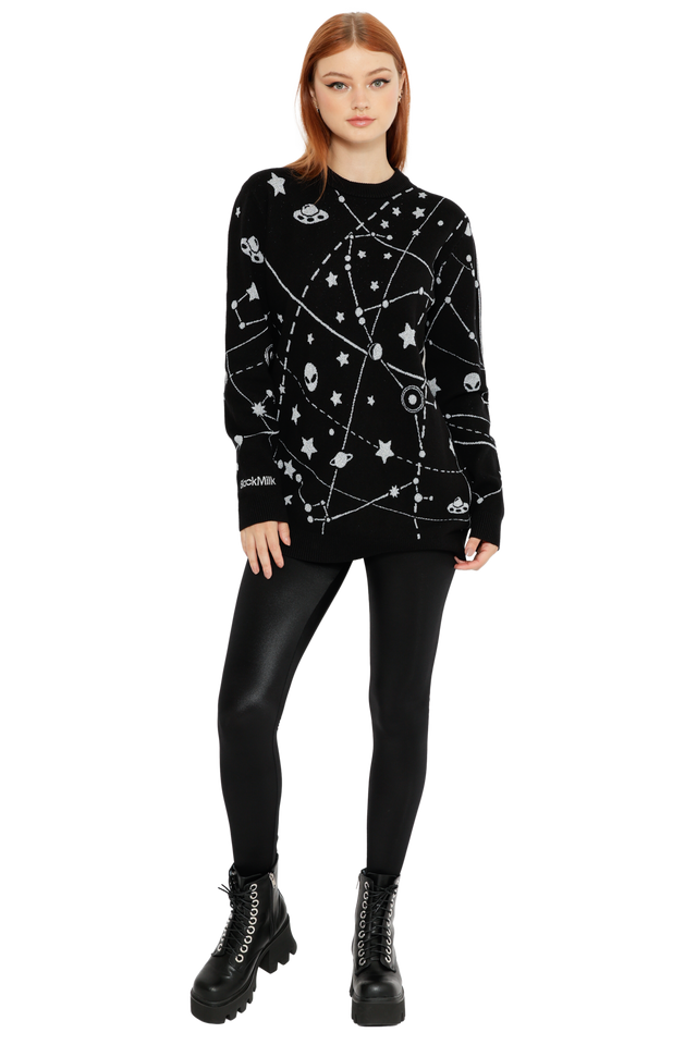 Space-themed black sweater with celestial star maps, UFO details and contrast white knit design