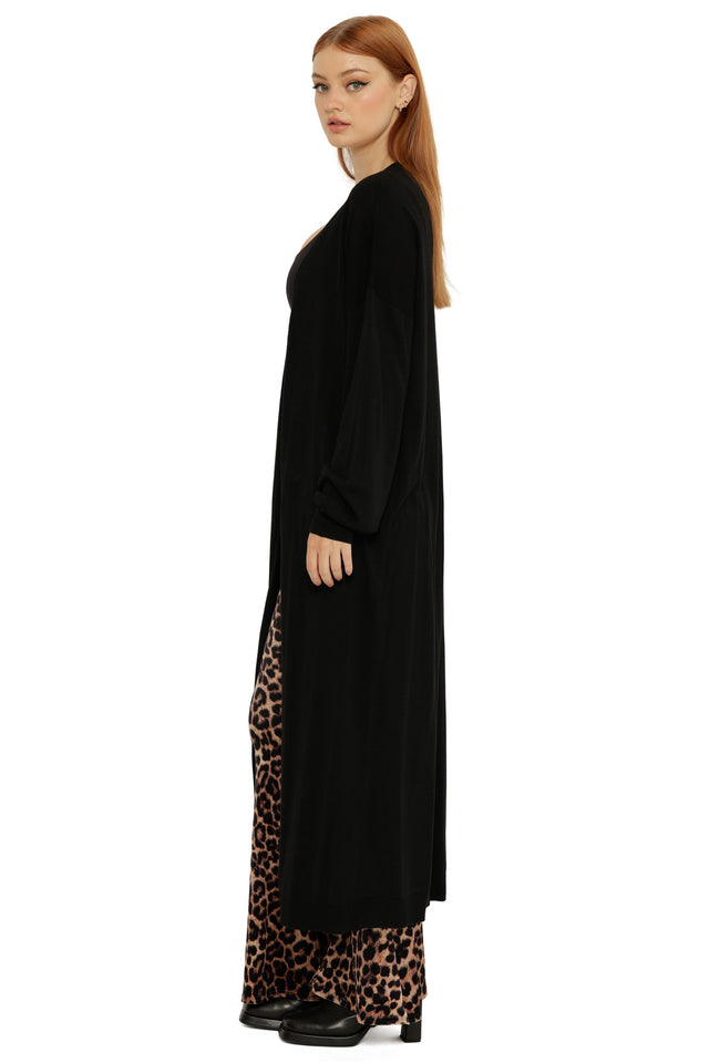 Open-front Black Super Cardigan with dropped shoulders, ribbed cuffs, and an oversized silhouette.