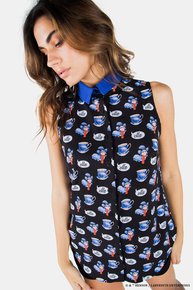 BlackMilk Labyrinth Ello Business Time Shirt - officially licensed Jim Henson's Labyrinth (1986) merch featuring the Worm character and 'ello speech bubble teacup print - front view of model wearing the sleeveless collared shirt in black with blue collar.