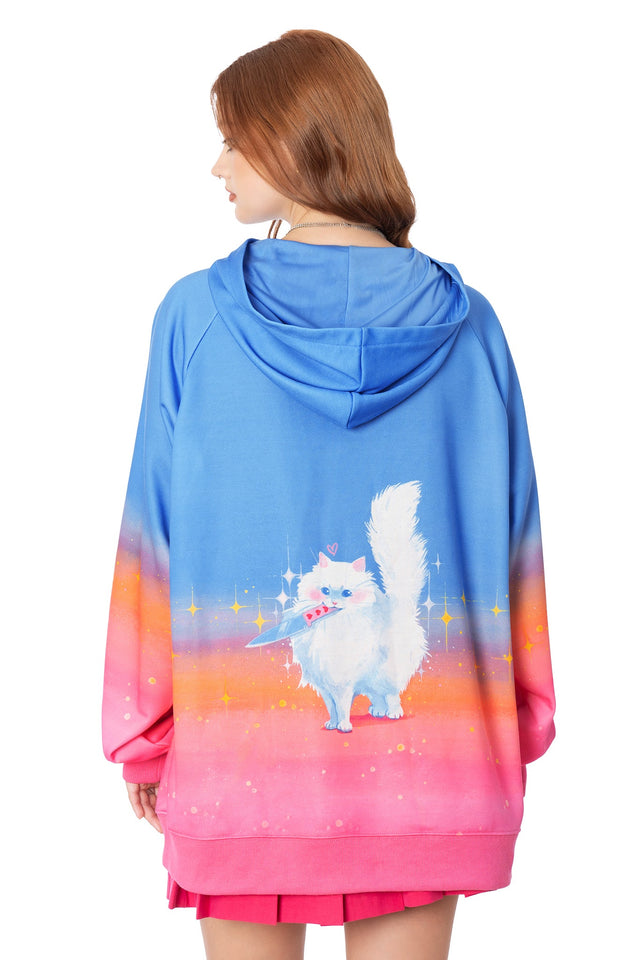 Model wearing pink oversized hoodie with Lora Zombie cat artwork and printed sleeve logos - wearable art