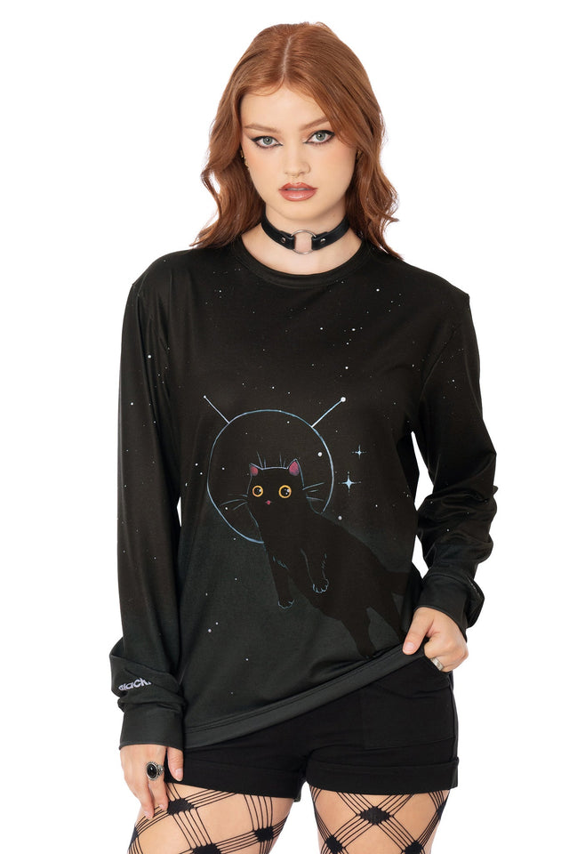 Close-up of Lora Zombie dissociating cat artwork on black long sleeve boyfriend tee - BlackMilk wearable art
