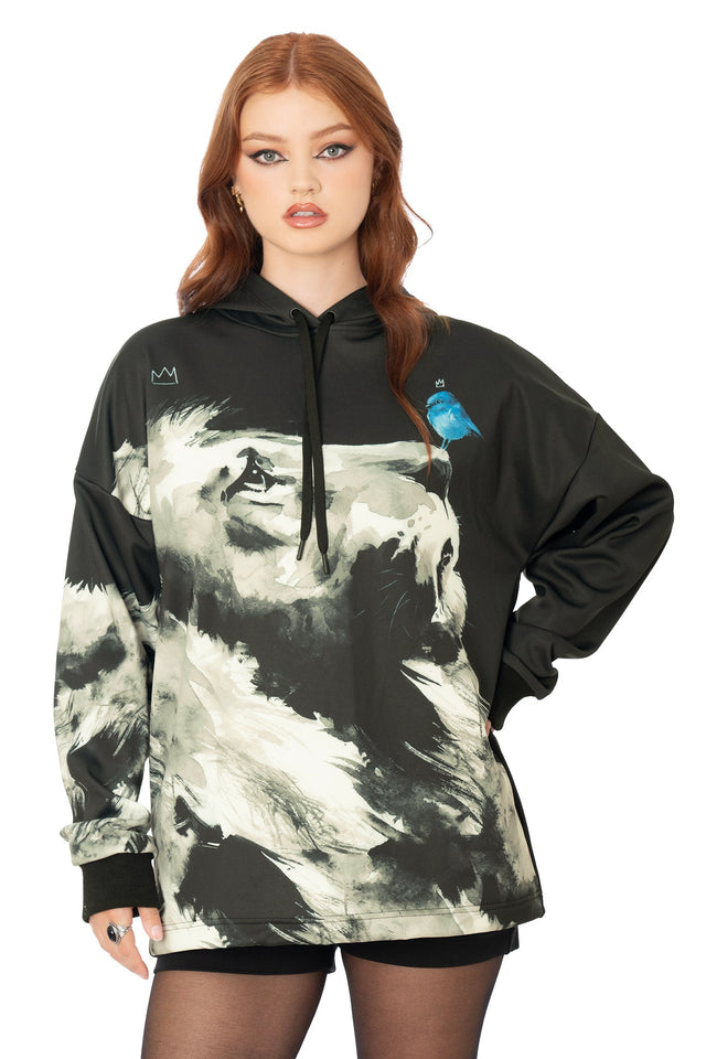 Close-up of Lora Zombie king lion artwork on black boxy hoodie - BlackMilk wearable art detail