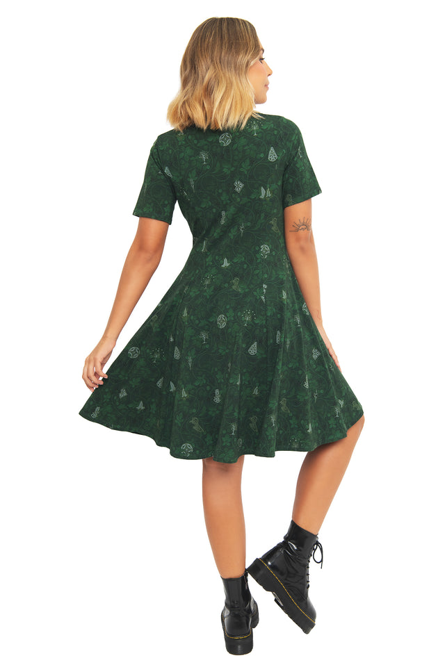 Back view of the BlackMilk Bag End Wallpaper Longline Tee Dress, showing the relaxed longline fit and Bag End wallpaper-inspired print in dark green.