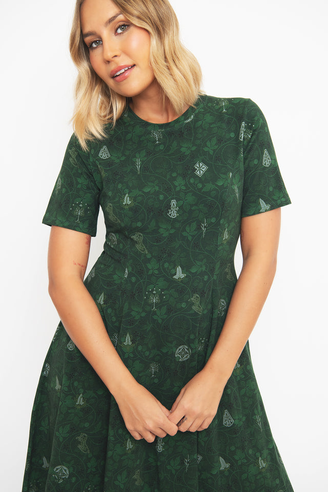 Full-length styled look of the BlackMilk Bag End Wallpaper Longline Evil Tee Dress paired with boots, a cottagecore-meets-gothic streetwear outfit inspired by the Shire.