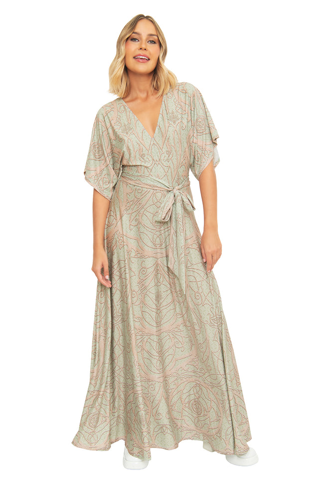 Close-up front view of the BlackMilk Lord of the Rings Elves of Middle-Earth Maxi Dress, showing the V-neckline and tie-waist belt detail against the sage green filigree print.
