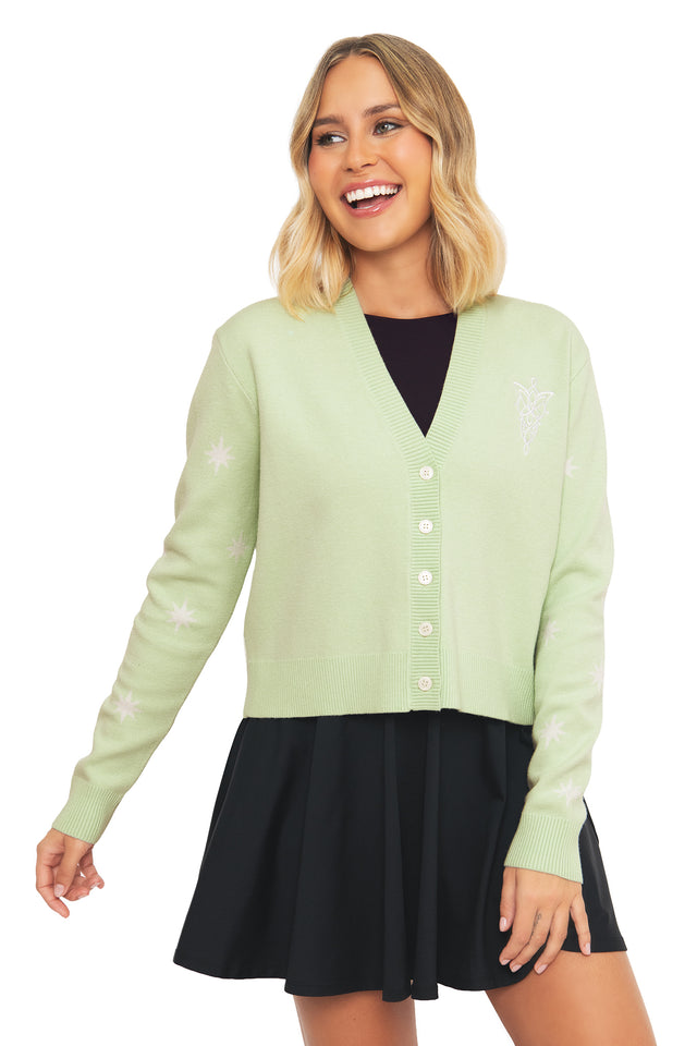 Front view of a model wearing the BlackMilk Fit For A Queen Knit Cardigan in pale sage green, featuring star embroidery on the sleeves and pearl button placket, inspired by Arwen and the Lord of the Rings.