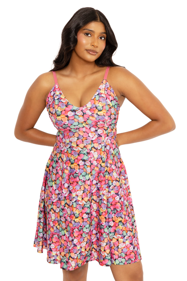 Candy Hearts Longline Strappy Dress featuring a flattering longline silhouette, adjustable straps and colourful heart print, perfect for summer outfits, casual styling, date nights and everyday wear.