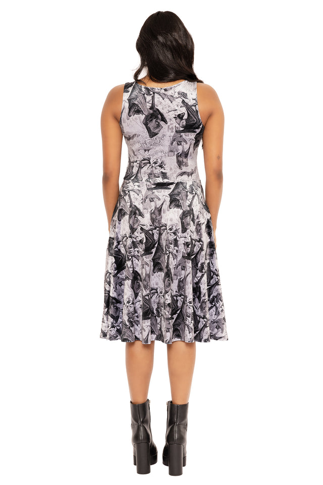 Soft stretch velvet midi dress with flattering princess silhouette, featuring detailed Cave Dwellers artwork perfect for alternative fashion, dark romantic styling and occasion dressing.