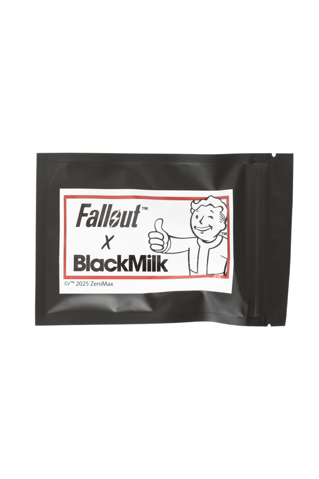 Fallout x BlackMilk Cap Currency Blind Bag featuring Vault Boy artwork and sealed packaging with collectible cap charm inside.