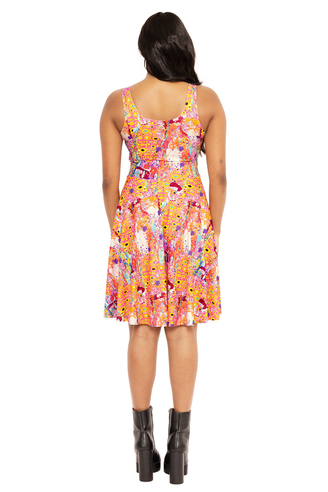 Water Serpent print scoop neck dress inspired by Gustav Klimt, combining statement artwork and effortless elegance for occasion wear and everyday fashion.