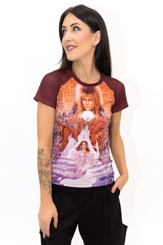 BlackMilk Labyrinth Ringer Tee - officially licensed Jim Henson's Labyrinth (1986) movie poster print featuring David Bowie as Jareth the Goblin King and Jennifer Connelly as Sarah - side angle view of model.
