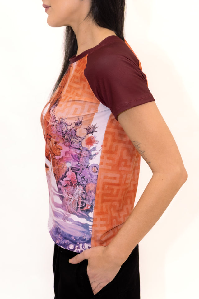BlackMilk Labyrinth Ringer Tee - close-up profile view of the officially licensed Jim Henson's Labyrinth (1986) movie poster print and maze pattern side panel, on a raglan tee with maroon sleeves.