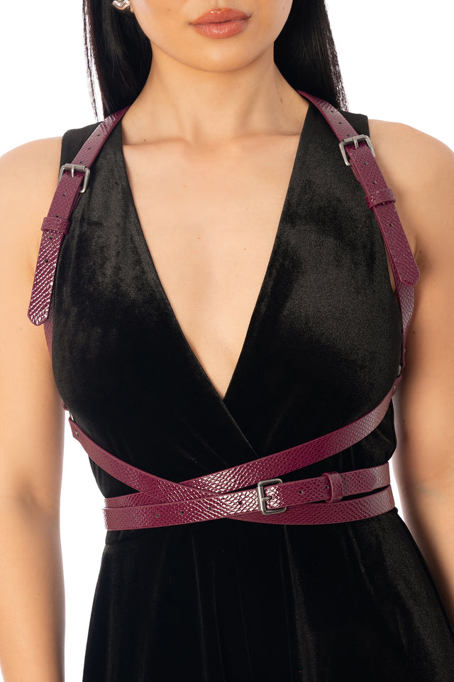 Additional product photograph 5 of the League of Legends K/DA x BlackMilk berry-pink strappy harness with adjustable buckle details, layered over a black outfit.