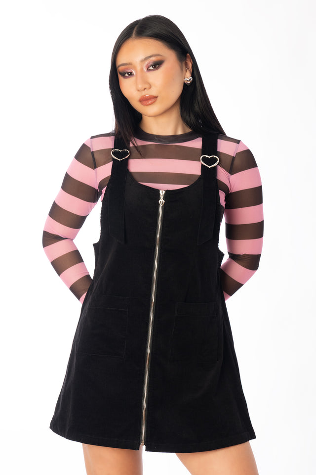 Additional product photograph 3 of the League of Legends K/DA x BlackMilk black corduroy pinafore mini dress with shoulder straps and a straight-cut silhouette.