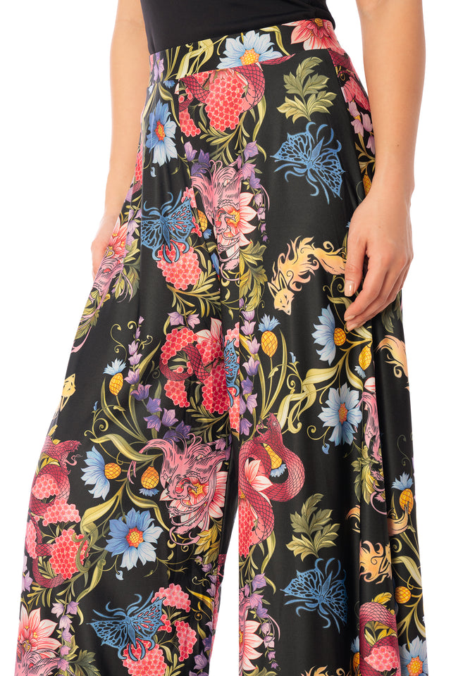 Additional product photograph 6 of the League of Legends K/DA x BlackMilk wide-leg palazzo pants with a colourful floral and animal-inspired K/DA print.