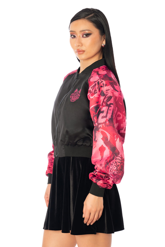 Additional product photograph 3 of the League of Legends K/DA x BlackMilk cropped black satin souvenir jacket with pink Akali tiger artwork on the back and contrasting patterned sleeves.