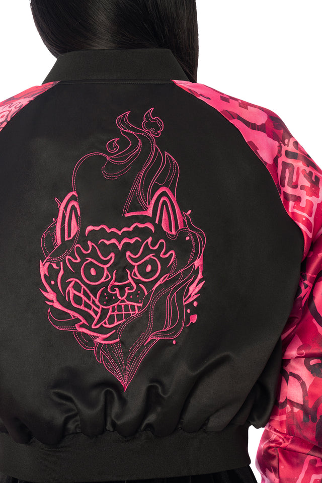 Additional product photograph 5 of the League of Legends K/DA x BlackMilk cropped black satin souvenir jacket with pink Akali tiger artwork on the back and contrasting patterned sleeves.