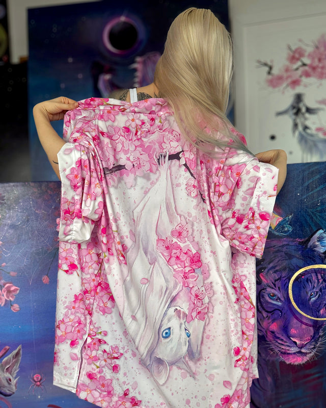 Lora Zombie illustrated Sakura robe with a fluid silhouette, wide sleeves, and lightweight fabric.