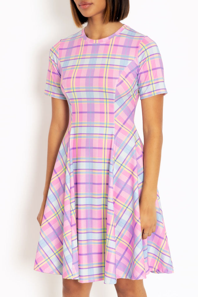 Women's tartan tee dress with relaxed oversized shape, designed for comfortable everyday wear, casual outings and effortless off-duty style.