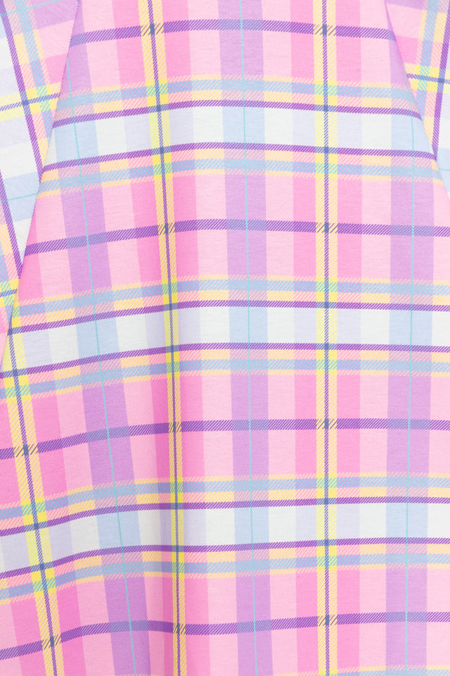 Colourful tartan print longline dress with oversized fit, ideal for pairing with tights, boots and jackets for year-round styling.