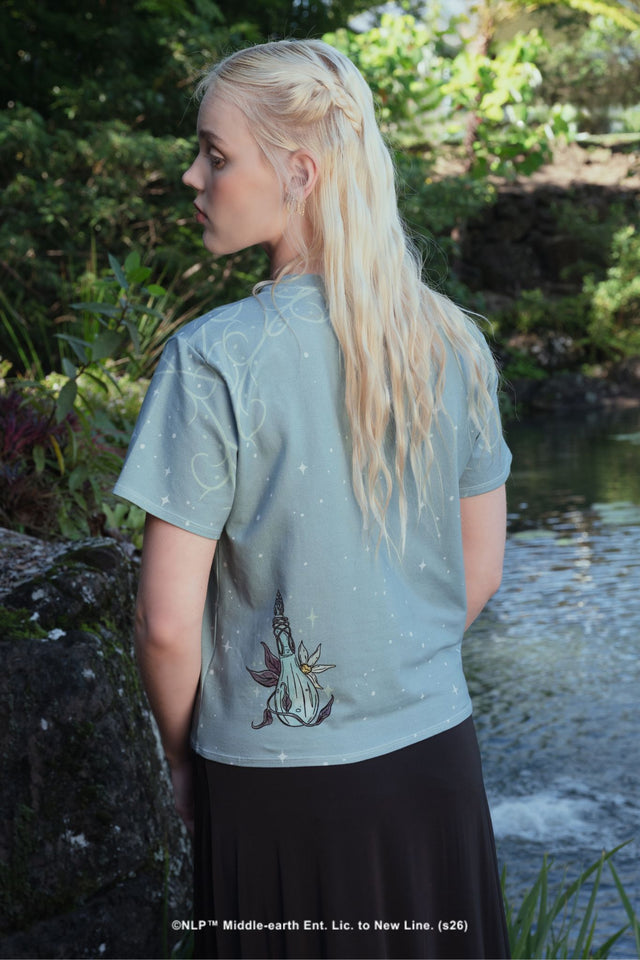 Lifestyle campaign photo of the BlackMilk Lord of the Rings Lady of Light Tie Front Tee, styled for an ethereal Galadriel-inspired look.